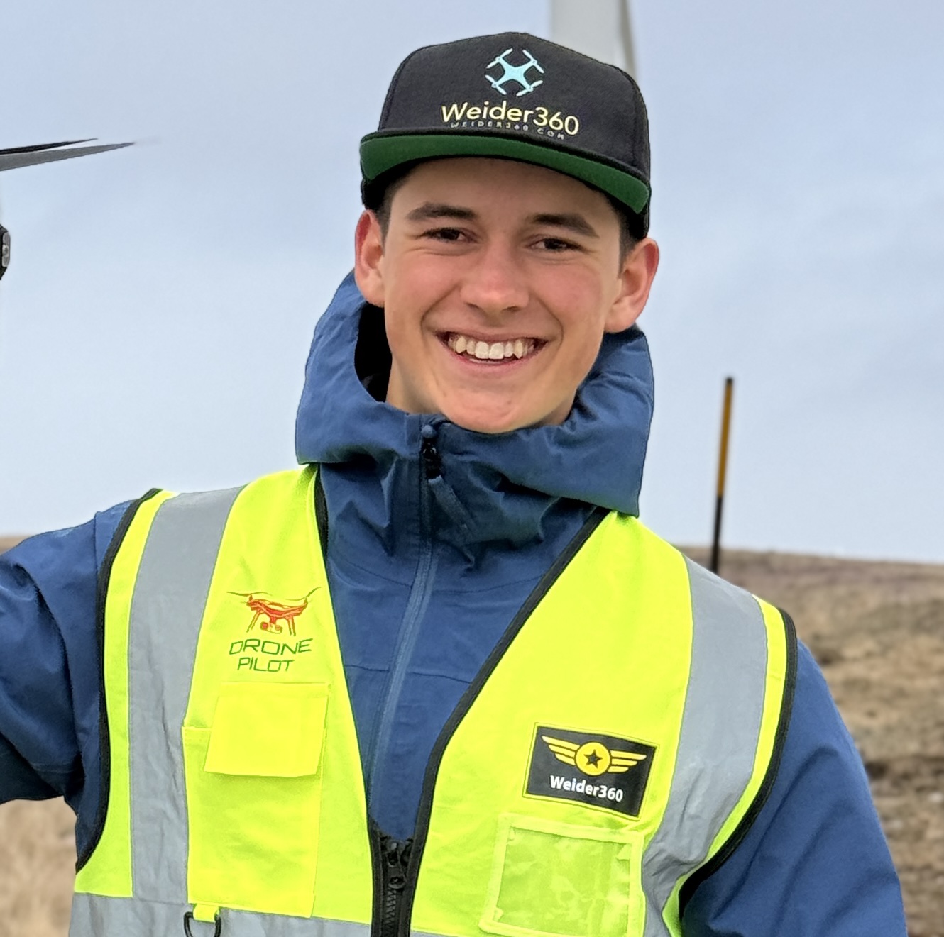 Martin Weider, founder of Weider360, in drone pilot field gear.